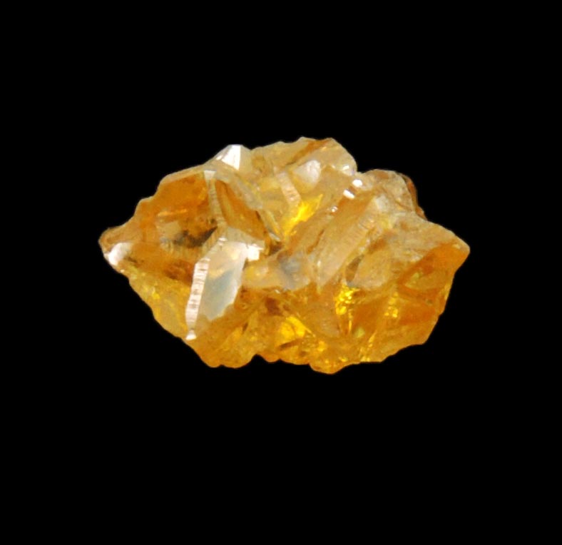 Diamond (0.89 carat cluster of fancy-yellow cavernous uncut diamonds) from Mbuji-Mayi, 300 km east of Tshikapa, Democratic Republic of the Congo