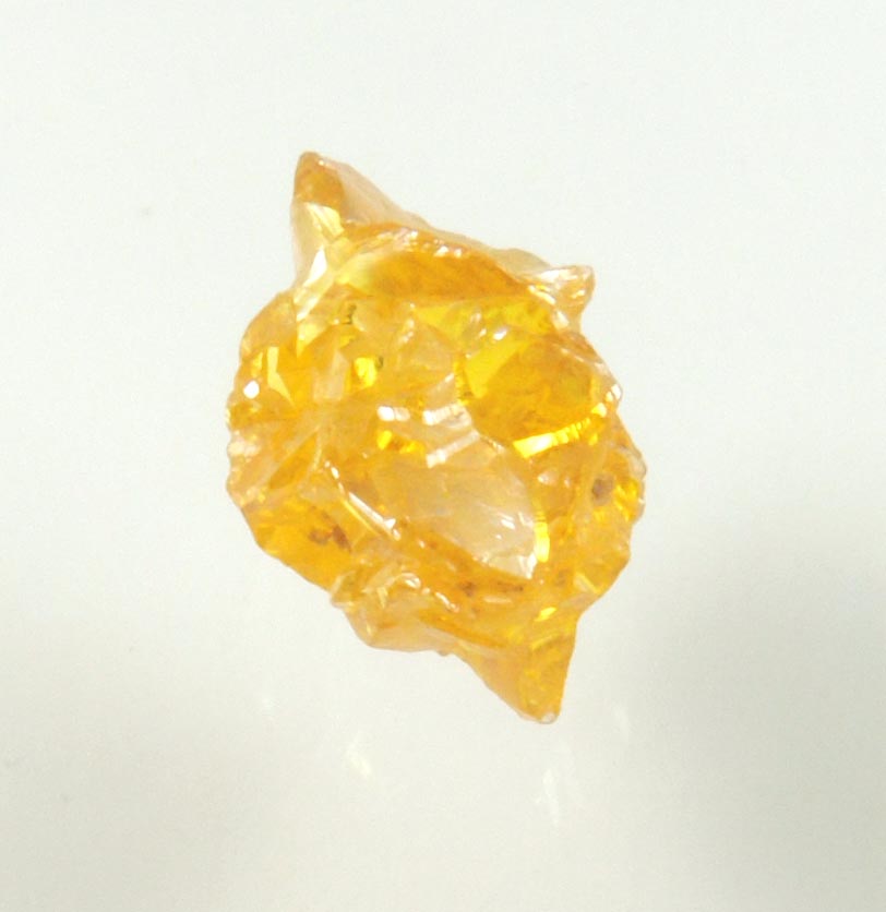 Diamond (0.89 carat cluster of fancy-yellow cavernous uncut diamonds) from Mbuji-Mayi, 300 km east of Tshikapa, Democratic Republic of the Congo