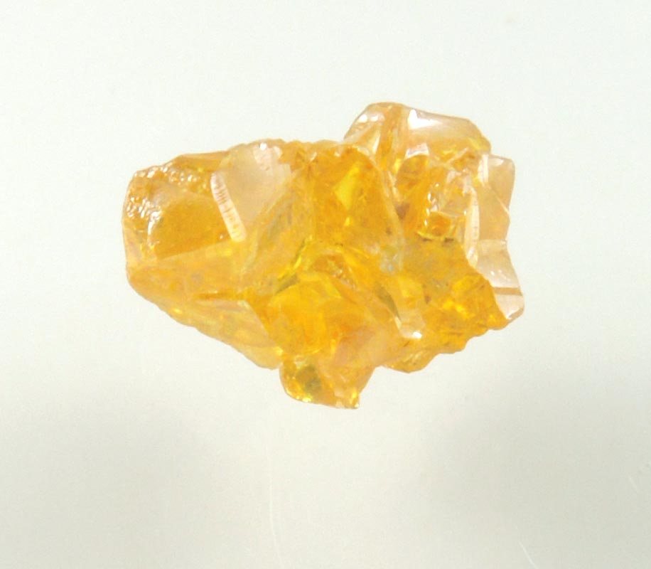 Diamond (0.89 carat cluster of fancy-yellow cavernous uncut diamonds) from Mbuji-Mayi, 300 km east of Tshikapa, Democratic Republic of the Congo