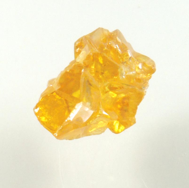 Diamond (0.89 carat cluster of fancy-yellow cavernous uncut diamonds) from Mbuji-Mayi, 300 km east of Tshikapa, Democratic Republic of the Congo