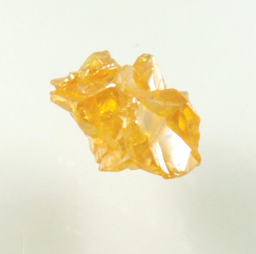 Diamond (0.89 carat cluster of fancy-yellow cavernous uncut diamonds) from Mbuji-Mayi, 300 km east of Tshikapa, Democratic Republic of the Congo