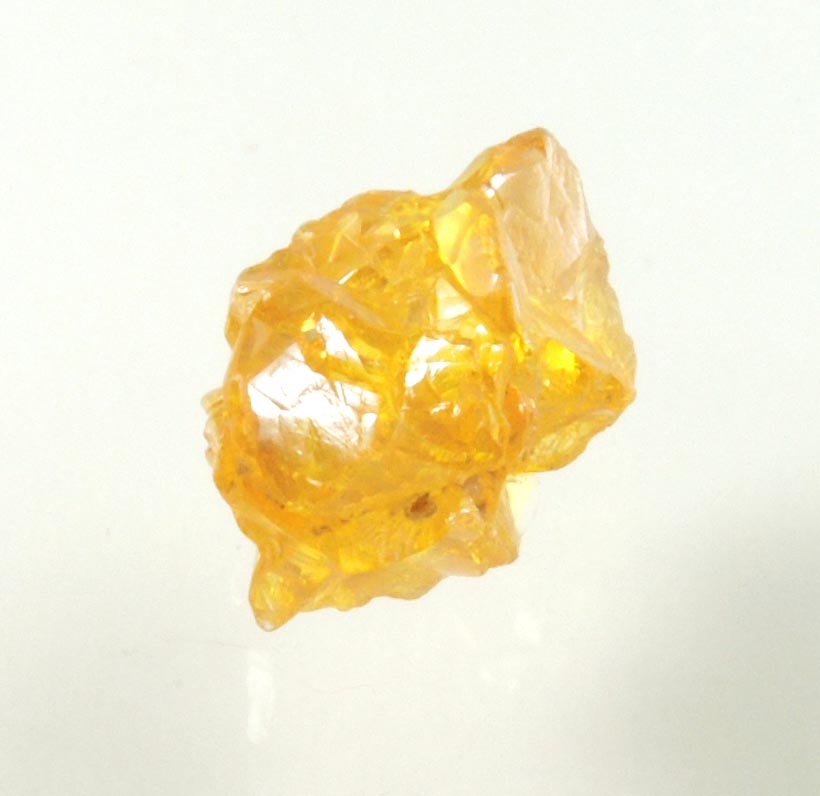 Diamond (0.89 carat cluster of fancy-yellow cavernous uncut diamonds) from Mbuji-Mayi, 300 km east of Tshikapa, Democratic Republic of the Congo