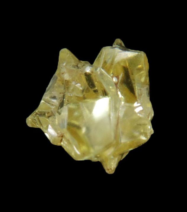Diamond (0.39 carat cluster of fancy-yellow cavernous uncut rough diamonds) from Mbuji-Mayi, 300 km east of Tshikapa, Democratic Republic of the Congo