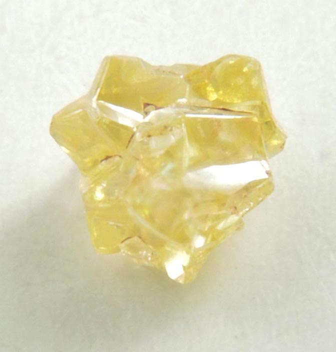 Diamond (0.39 carat cluster of fancy-yellow cavernous uncut rough diamonds) from Mbuji-Mayi, 300 km east of Tshikapa, Democratic Republic of the Congo