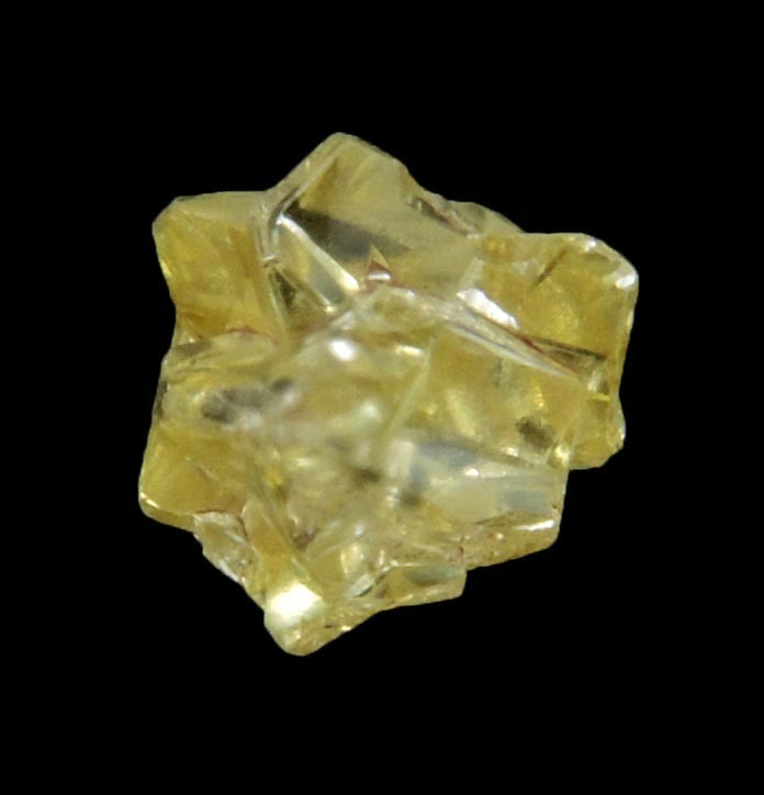 Diamond (0.39 carat cluster of fancy-yellow cavernous uncut rough diamonds) from Mbuji-Mayi, 300 km east of Tshikapa, Democratic Republic of the Congo