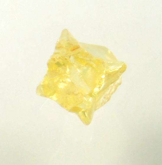 Diamond (0.25 carat fancy-yellow cavernous uncut diamond) from Mbuji-Mayi, 300 km east of Tshikapa, Democratic Republic of the Congo