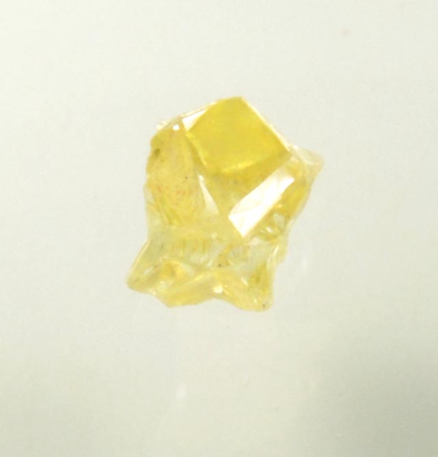 Diamond (0.25 carat fancy-yellow cavernous uncut diamond) from Mbuji-Mayi, 300 km east of Tshikapa, Democratic Republic of the Congo