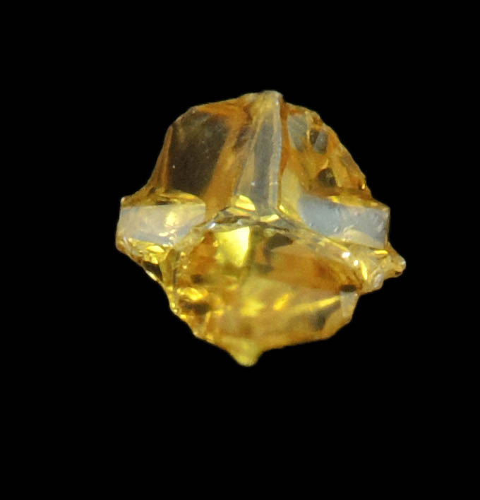 Diamond (0.22 carat fancy-yellow-yellow cavernous crystal) from Mbuji-Mayi, 300 km east of Tshikapa, Democratic Republic of the Congo