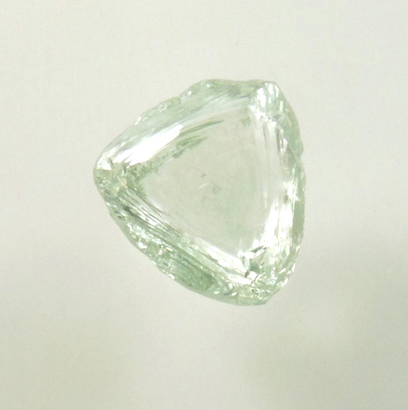 Diamond (1.52 carat cuttable fancy-green macle, twinned rough diamond) from Almazy Anabara Mine, Sakha (Yakutia) Republic, Siberia, Russia