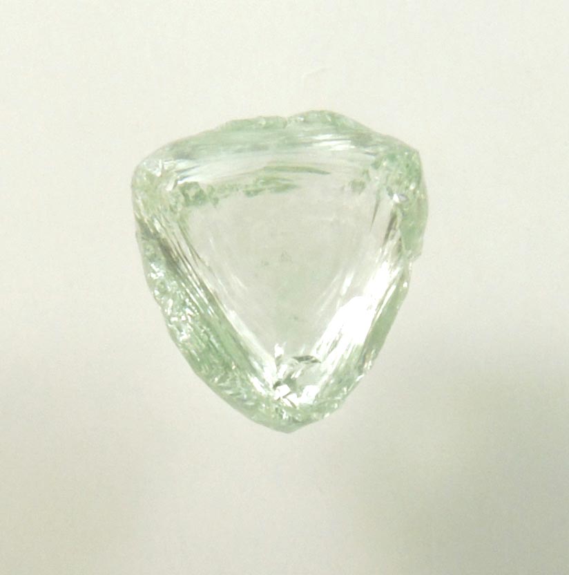 Diamond (1.52 carat cuttable fancy-green macle, twinned rough diamond) from Almazy Anabara Mine, Sakha (Yakutia) Republic, Siberia, Russia