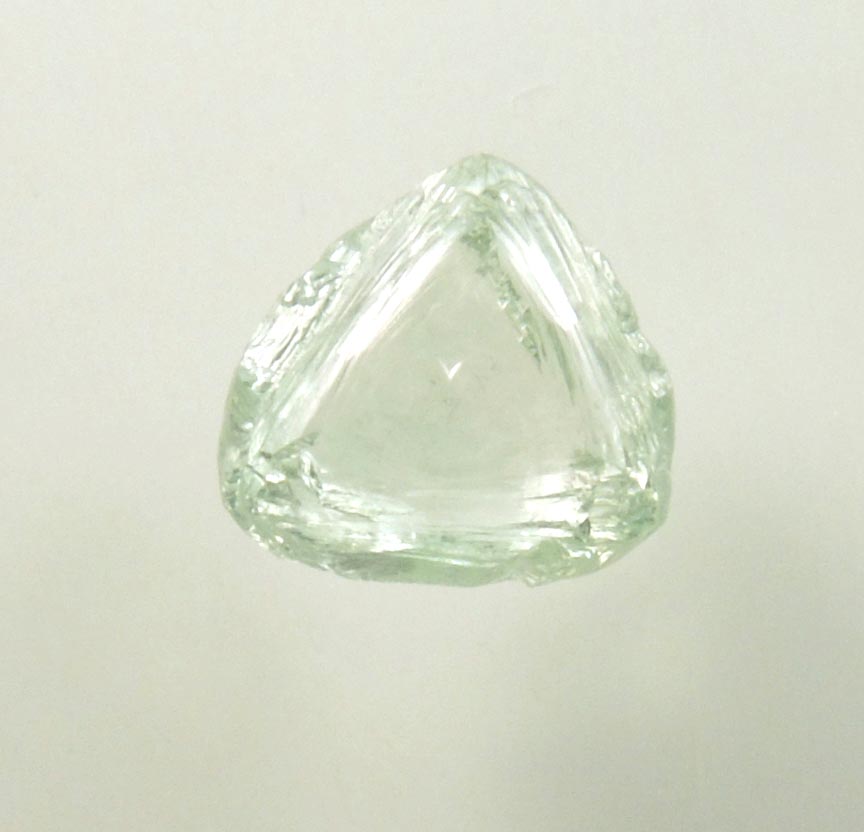 Diamond (1.52 carat cuttable fancy-green macle, twinned rough diamond) from Almazy Anabara Mine, Sakha (Yakutia) Republic, Siberia, Russia