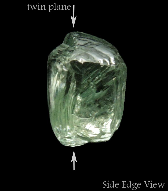 Diamond (1.52 carat cuttable fancy-green macle, twinned rough diamond) from Almazy Anabara Mine, Sakha (Yakutia) Republic, Siberia, Russia