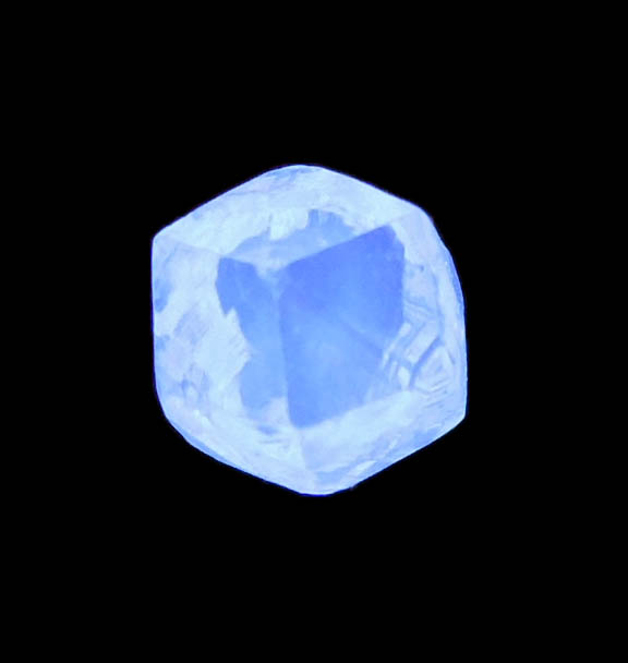 Photo below under longwave ultraviolet illumination of Diamond (1.52 carat gem-grade yellow tetrahexahedral uncut diamond) from Almazy Anabara Mine, Sakha (Yakutia) Republic, Siberia, Russia Diamond (1.52 carat gem-grade yellow tetrahexahedral uncut diamond) from Almazy Anabara Mine, Sakha (Yakutia) Republic, Siberia, Russia