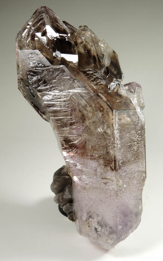 Quartz var. Smoky-Amethyst Quartz with 2 movable bubbles (enhydro) from Goboboseb Mountains, 43 km west of Brandberg Mountain, Erongo region, Namibia