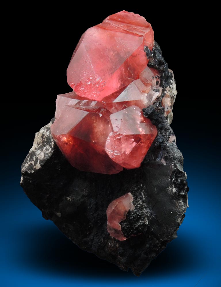 Rhodochrosite on manganese oxide from Uchucchaqua Mine, Oyon Province, Lima Department, Peru