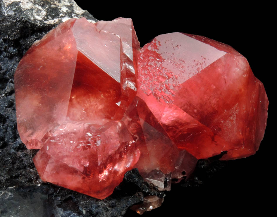 Rhodochrosite on manganese oxide from Uchucchaqua Mine, Oyon Province, Lima Department, Peru