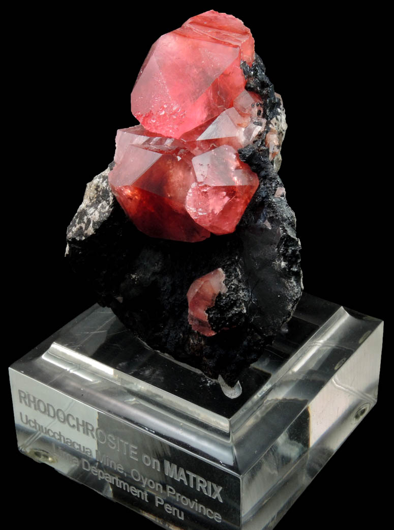 Rhodochrosite on manganese oxide from Uchucchaqua Mine, Oyon Province, Lima Department, Peru