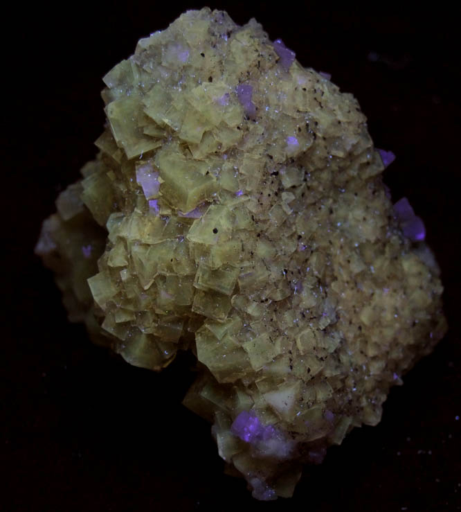 Photo below under shortwave ultraviolet illumination of Fluorite with Dolomite from Moscona Mine, Solis, Villabona District, Asturias, Spain Fluorite with Dolomite from Moscona Mine, Solis, Villabona District, Asturias, Spain