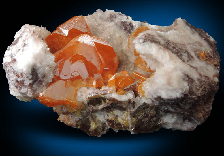 Wulfenite on Calcite from Sierra de Los Lamentos, Chihuahua, Mexico