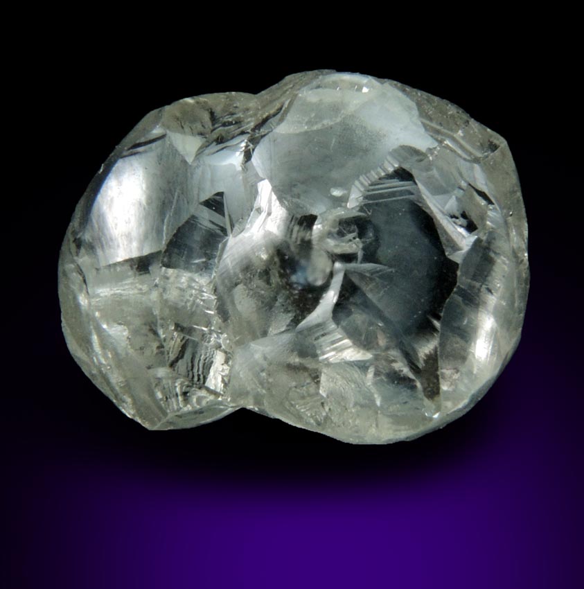 Diamond (4.50 carat pale-gray flattened complex uncut diamond cluster) from Oranjemund District, southern coastal Namib Desert, Namibia