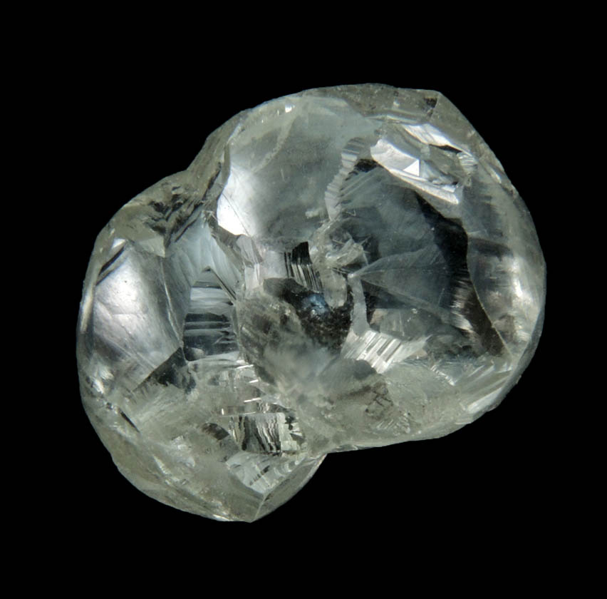 Diamond (4.50 carat pale-gray flattened complex uncut diamond cluster) from Oranjemund District, southern coastal Namib Desert, Namibia