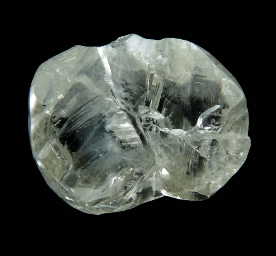 Diamond (4.50 carat pale-gray flattened complex uncut diamond cluster) from Oranjemund District, southern coastal Namib Desert, Namibia