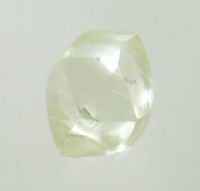 Diamond (0.64 carat cuttable yellow-green tetrahexahedral rough diamond) from Oranjemund District, southern coastal Namib Desert, Namibia