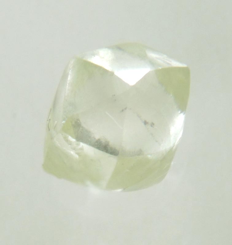 Diamond (0.64 carat cuttable yellow-green tetrahexahedral rough diamond) from Oranjemund District, southern coastal Namib Desert, Namibia