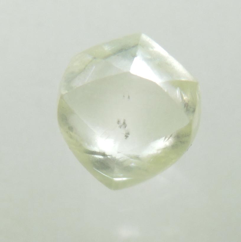 Diamond (0.64 carat cuttable yellow-green tetrahexahedral rough diamond) from Oranjemund District, southern coastal Namib Desert, Namibia