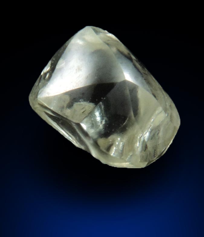 Diamond (0.66 carat cuttable pale-yellow complex rough diamond) from Orapa Mine, south of the Makgadikgadi Pans, Botswana