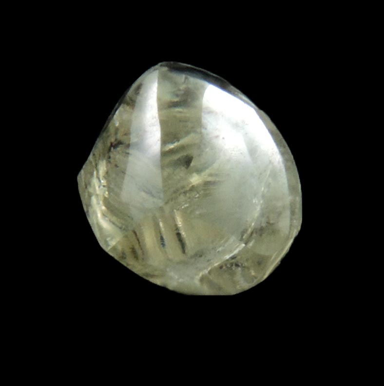 Diamond (0.66 carat cuttable pale-yellow complex rough diamond) from Orapa Mine, south of the Makgadikgadi Pans, Botswana