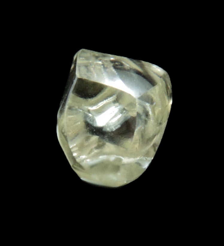 Diamond (0.66 carat cuttable pale-yellow complex rough diamond) from Orapa Mine, south of the Makgadikgadi Pans, Botswana