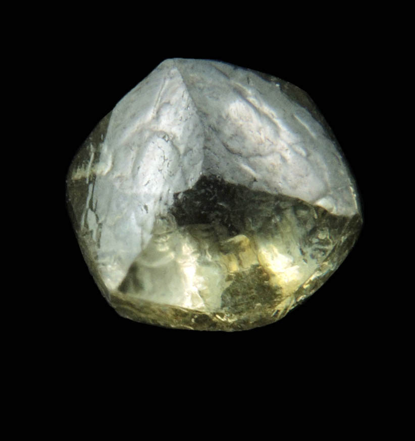 Diamond (1.29 carat fancy yellowish-green flattened dodecahedral uncut diamond) from Oranjemund District, southern coastal Namib Desert, Namibia