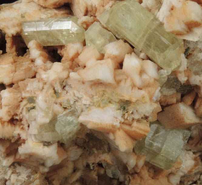 Fluorapatite in Microcline from Imilchil, High Atlas Mountains, Errachidia Province, Morocco