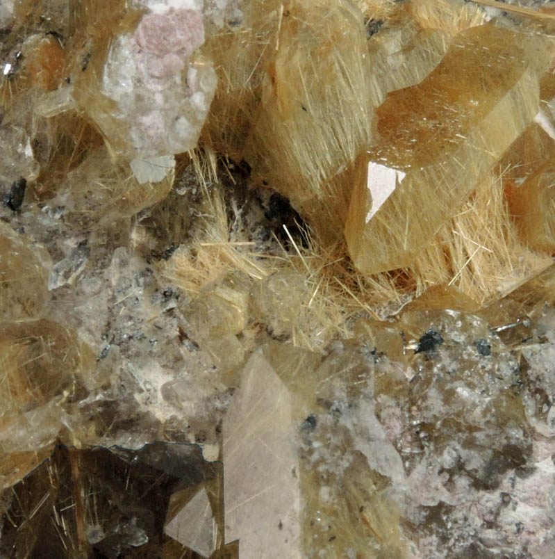 Rutile and Hematite on Quartz with Rutile inclusions from Ibitiara, south of Novo Horizonte, Bahia, Brazil