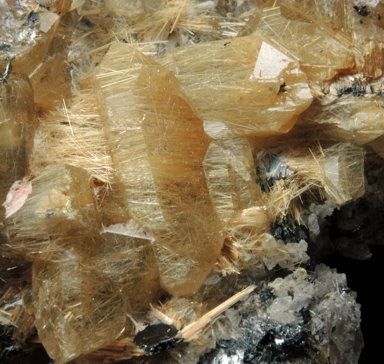 Rutile and Hematite on Quartz with Rutile inclusions from Ibitiara, south of Novo Horizonte, Bahia, Brazil