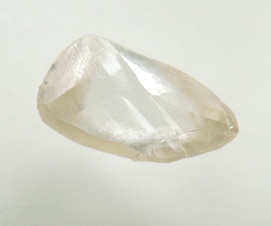 Diamond (1.27 carat pale-brown elongated macle, twinned uncut diamond) from Northern Cape Province, South Africa