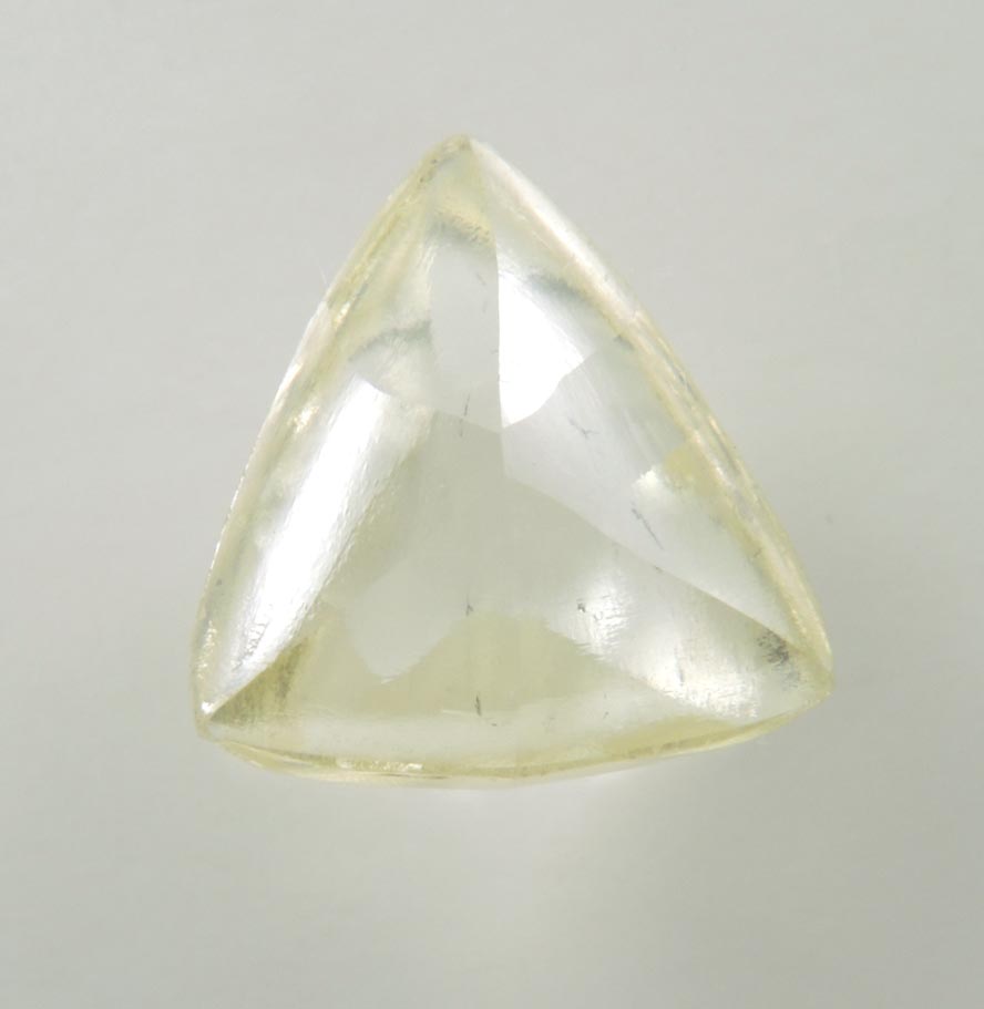 Diamond (1.58 carat gem-grade fancy-yellow macle, twinned uncut diamond) from Orapa Mine, south of the Makgadikgadi Pans, Botswana