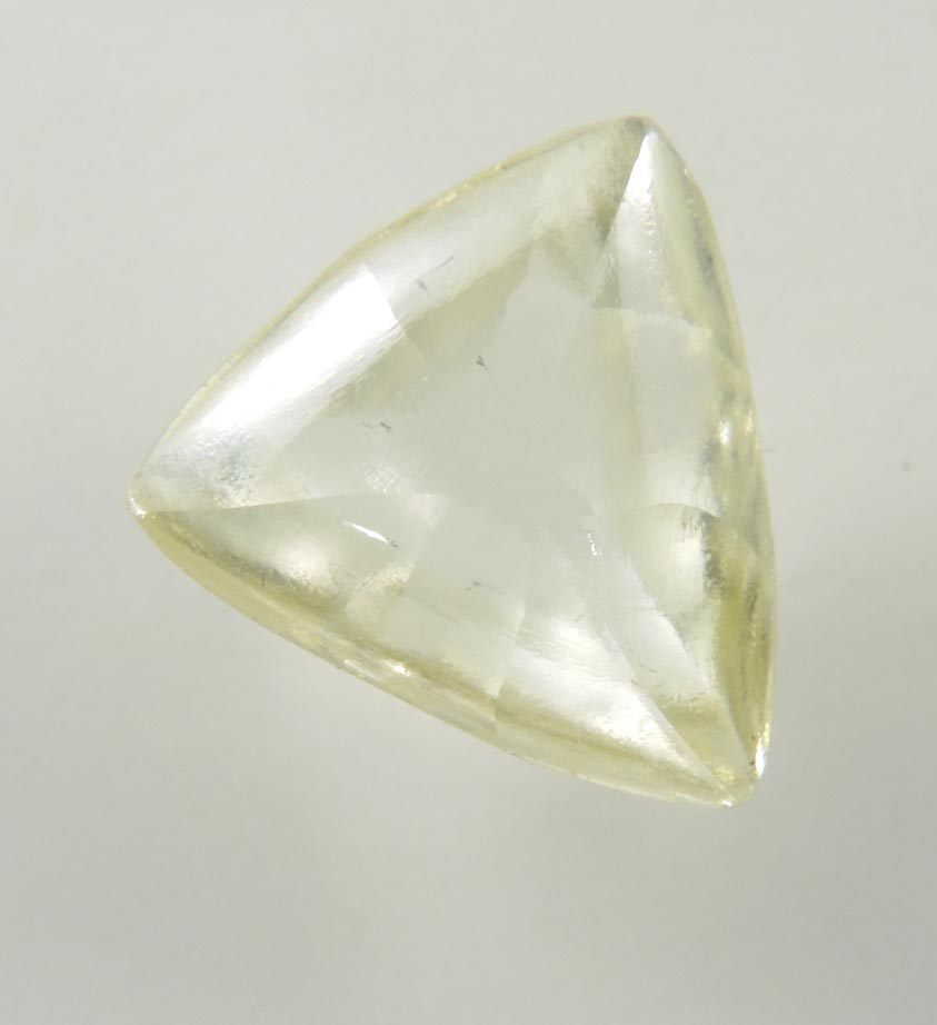 Diamond (1.58 carat gem-grade fancy-yellow macle, twinned uncut diamond) from Orapa Mine, south of the Makgadikgadi Pans, Botswana