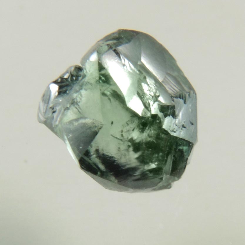 Diamond (0.93 carat fancy-intense green complex uncut diamond) from Almazy Anabara Mine, Sakha (Yakutia) Republic, Siberia, Russia
