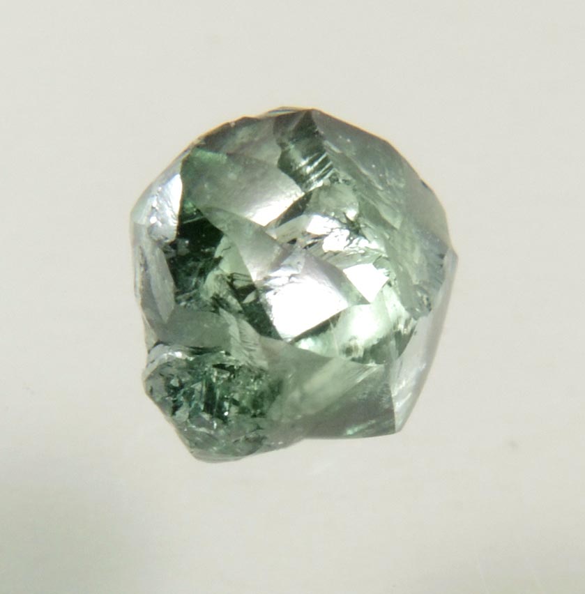 Diamond (0.93 carat fancy-intense green complex uncut diamond) from Almazy Anabara Mine, Sakha (Yakutia) Republic, Siberia, Russia