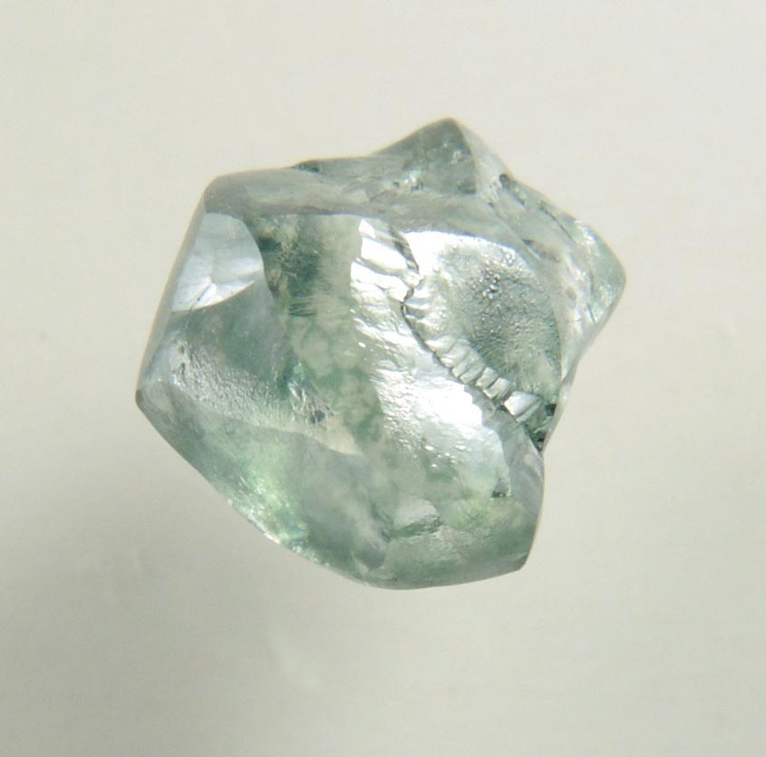 Diamond (0.89 carat fancy-intense green complex rough diamond) from Almazy Anabara Mine, Sakha (Yakutia) Republic, Siberia, Russia