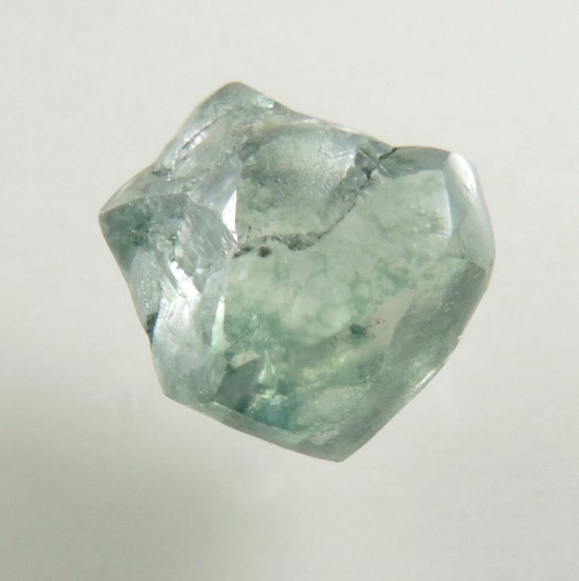 Diamond (0.89 carat fancy-intense green complex rough diamond) from Almazy Anabara Mine, Sakha (Yakutia) Republic, Siberia, Russia