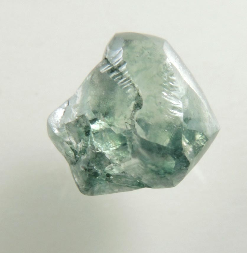 Diamond (0.89 carat fancy-intense green complex rough diamond) from Almazy Anabara Mine, Sakha (Yakutia) Republic, Siberia, Russia