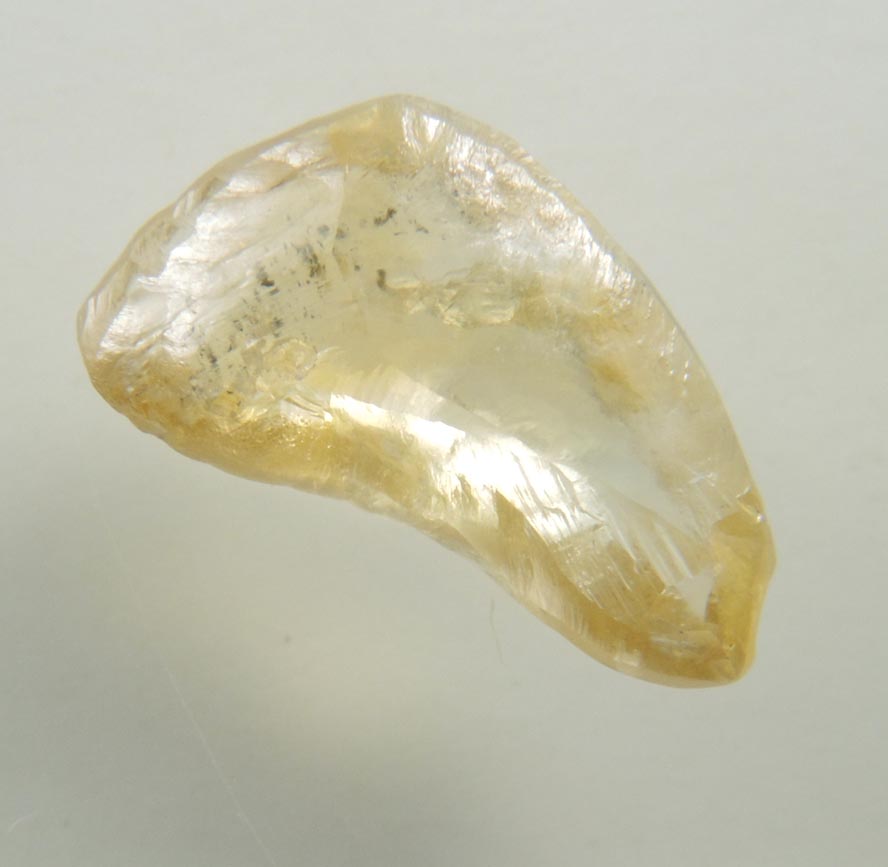 Diamond (1.72 carat yellow-orange curved crystal) from Northern Cape Province, South Africa
