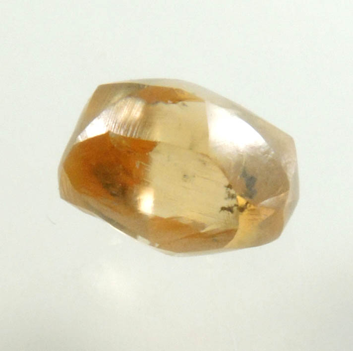 Diamond (0.97 carat fancy orange-brown elongated dodecahedral uncut diamond) from Northern Cape Province, South Africa