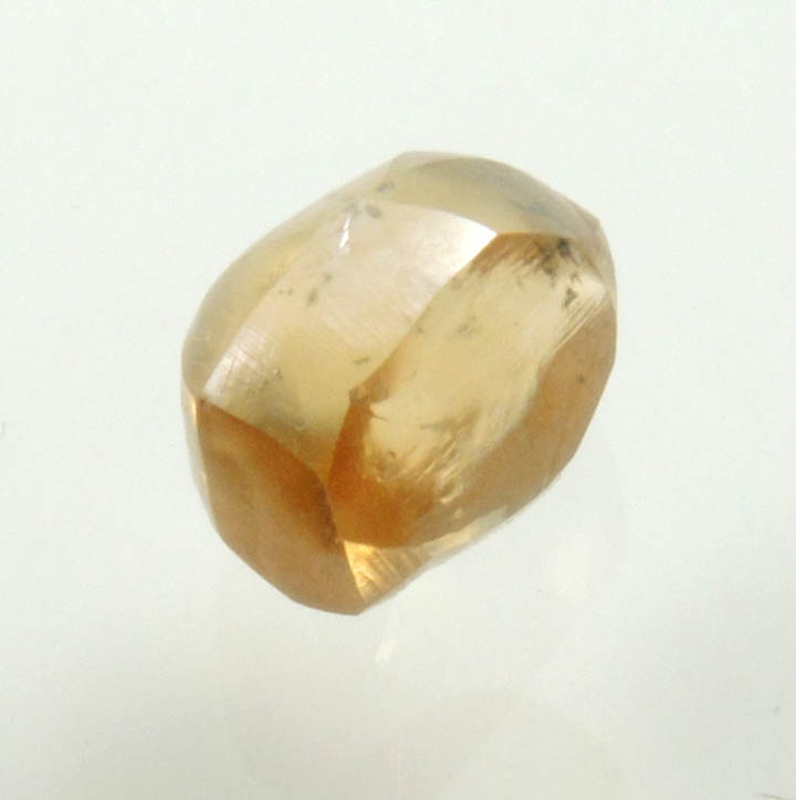 Diamond (0.97 carat fancy orange-brown elongated dodecahedral uncut diamond) from Northern Cape Province, South Africa