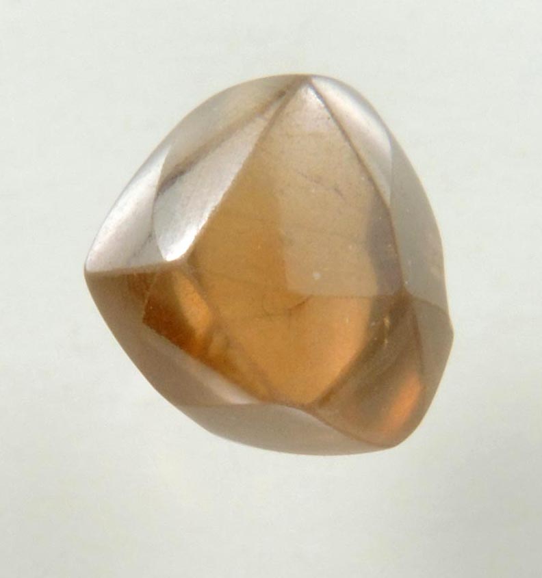 Diamond (0.94 carat fancy orange-brown distorted dodecahedral rough diamond) from Northern Cape Province, South Africa
