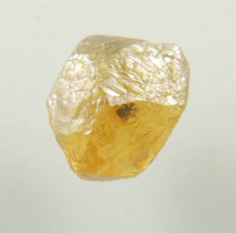 Diamond (0.66 carat fancy-yellow asymmetric dodecahedral uncut rough diamond) from Northern Cape Province, South Africa