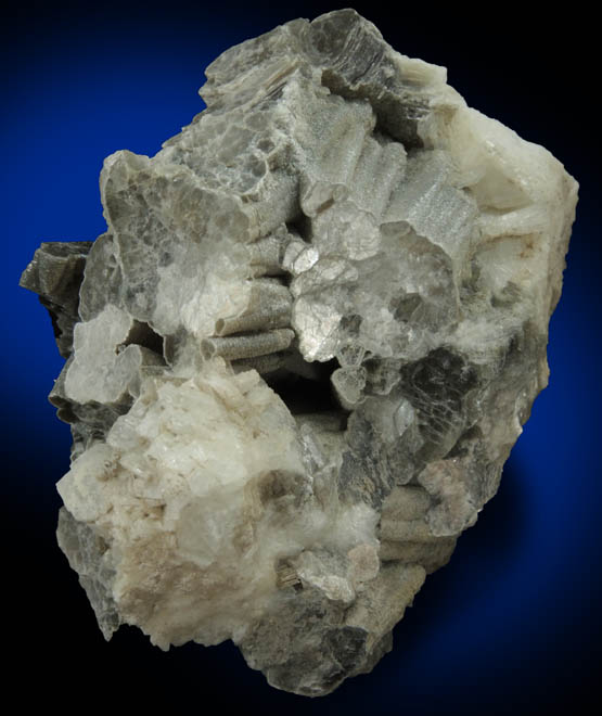 Muscovite (columnar crystals) on Albite var. Cleavelandite from Emmons Quarry, southeastern slope of Uncle Tom Mountain,  Greenwood, Oxford County, Maine